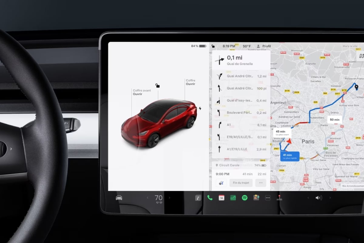 Écran central Tesla Model 3 affichant navigation en Île-de-France, planification de recharge Supercharger et contrôle du véhicule, essentiel pour un guide d'achat voiture électrique.