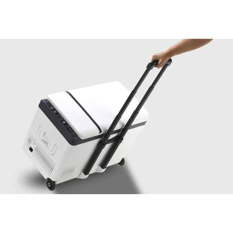 glacière Norauto à compresseur installée dans le coffre d’un véhicule