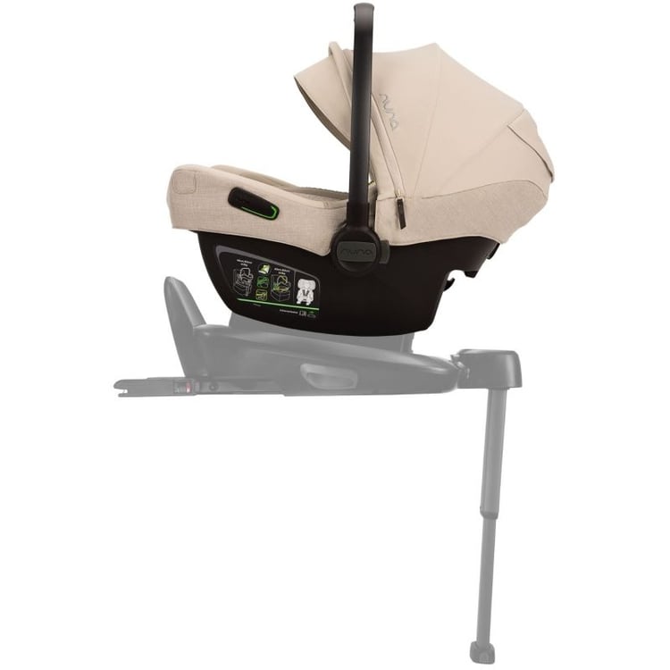 Coque Nuna Pipa Next de profil sur sa base Next à jambe de force
